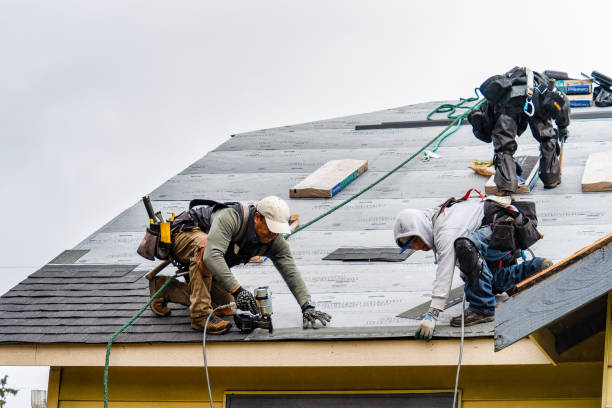 Professional Gutter Installation technician working in Franklin, MA